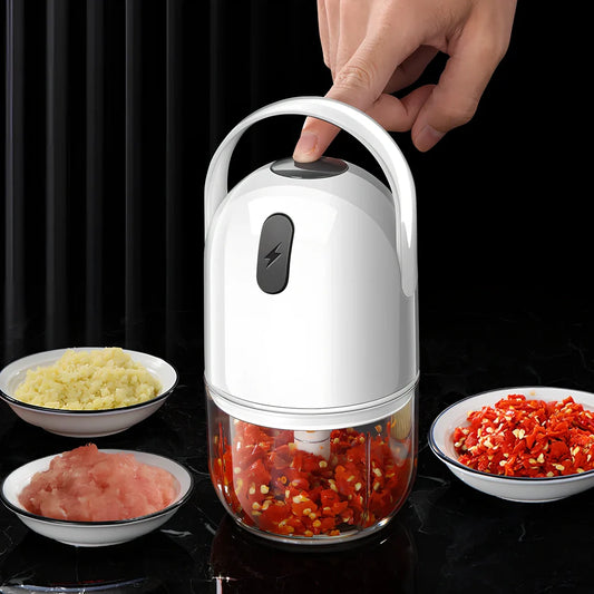 White electric garlic masher with USB cable, showing 280ml capacity chamber and compact 9cm width design