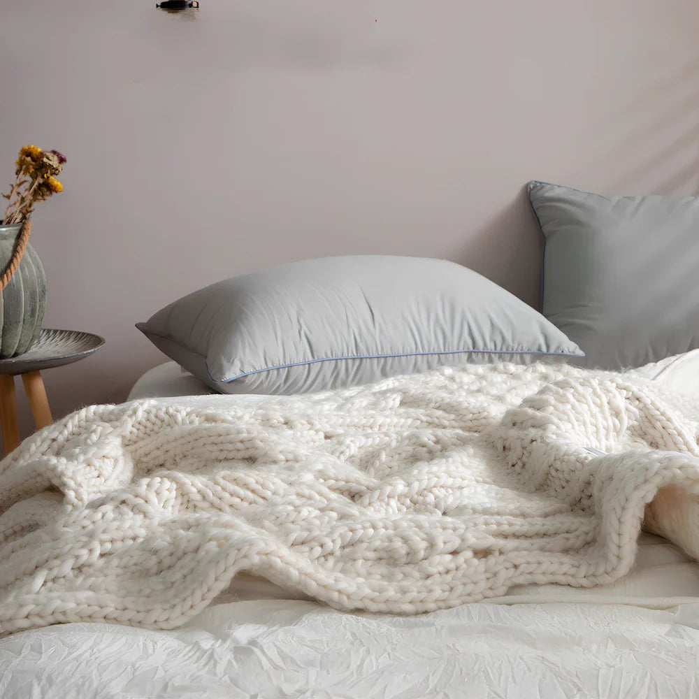 Beige hand-woven acrylic wool blanket 120x150cm 1.7kg on sofa, low 2-3% shrinkage