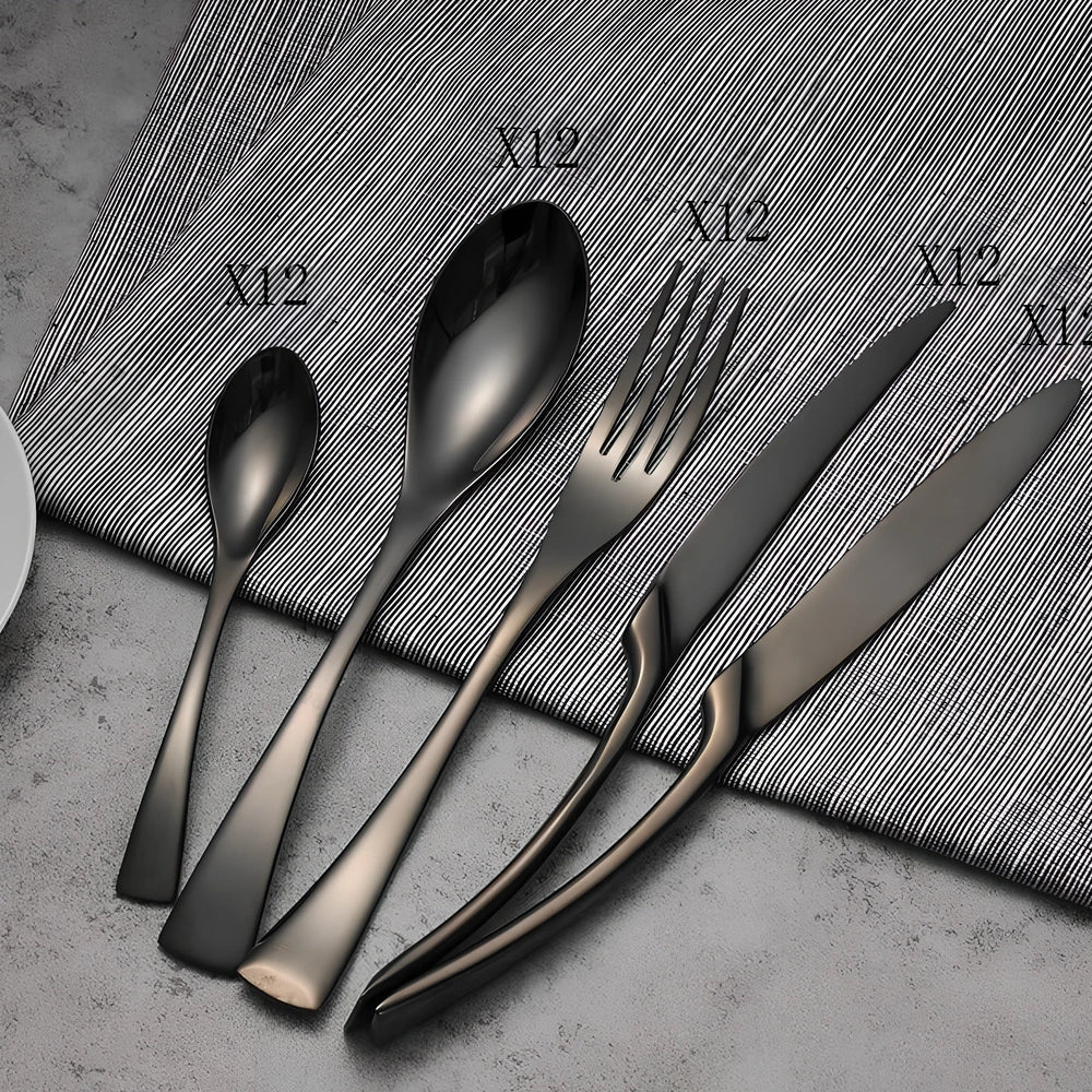 Four-piece black stainless steel cutlery set with mirror polishing showing fork, knife, coffee spoon, and soup spoon