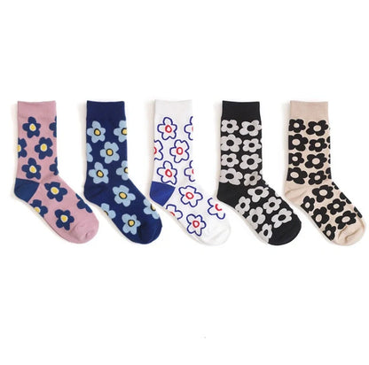 Cozy cotton socks featuring a playful cartoon flower pattern, designed for breathability and comfort.