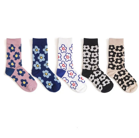 Cozy cotton socks featuring a playful cartoon flower pattern, designed for breathability and comfort.
