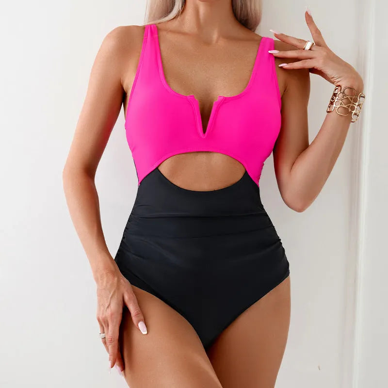 Women's one-piece swimsuit in a contrast colour design, available in black, brown, dark pink, and green.