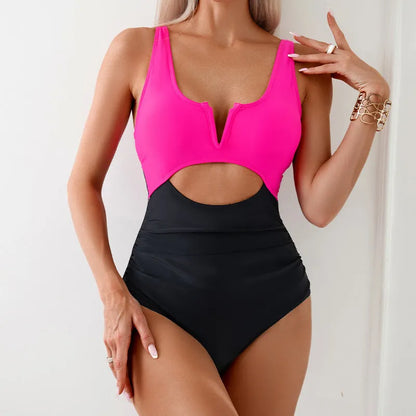 Women's one-piece swimsuit in a contrast colour design, available in black, brown, dark pink, and green.