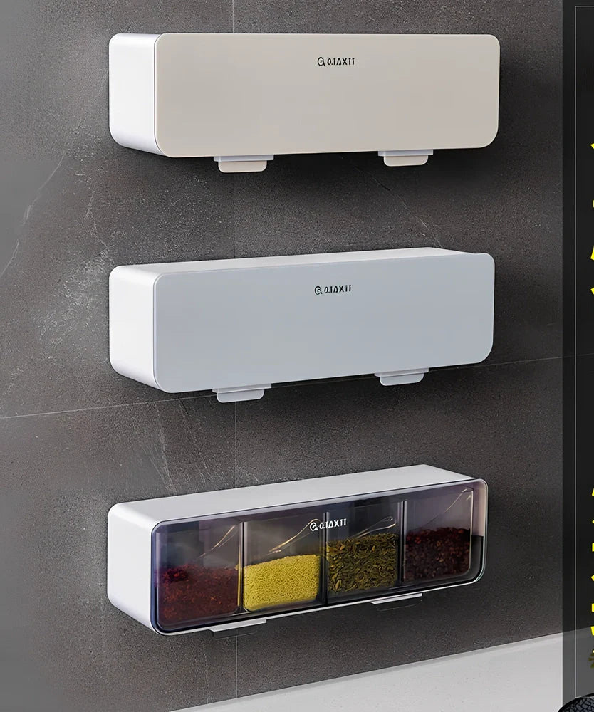 Wall-mounted plastic spice box set with multiple compartments and measuring spoon in kitchen