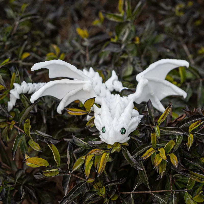Red and gold 3D printed plastic dragon wings decoration for costumes.