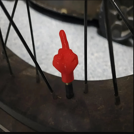 Four skin colour and four black latex tyre valve caps for car and bicycle valves