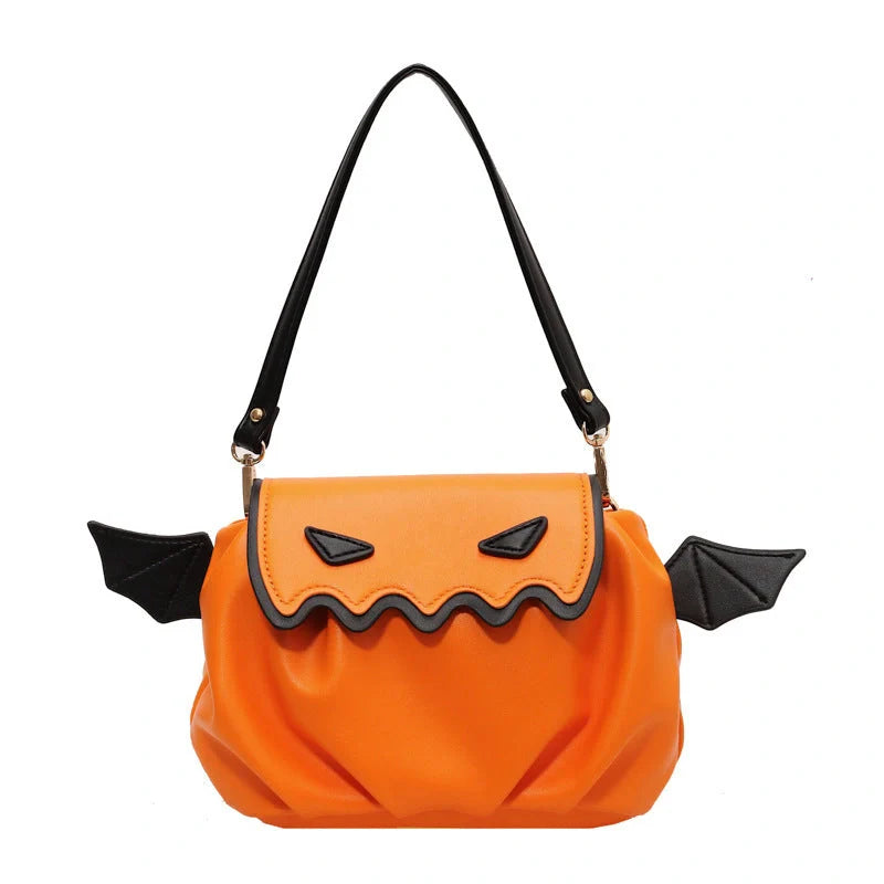 Halloween pumpkin cartoon crossbody bag with small wings in black, white, and orange