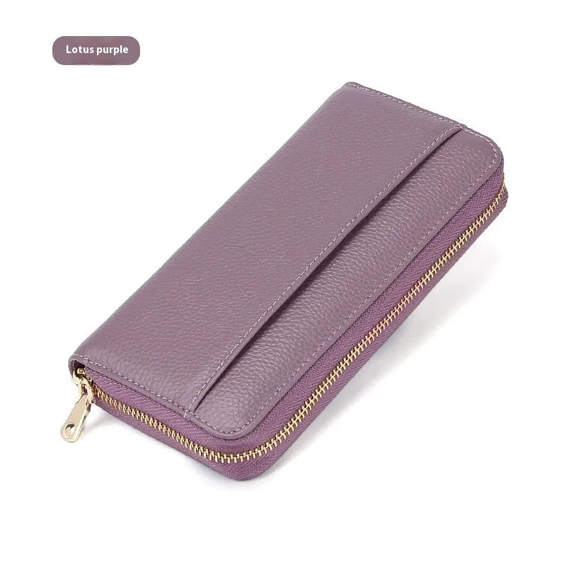 Long genuine leather women's wallet in solid colours with 12 card slots and anti-theft design