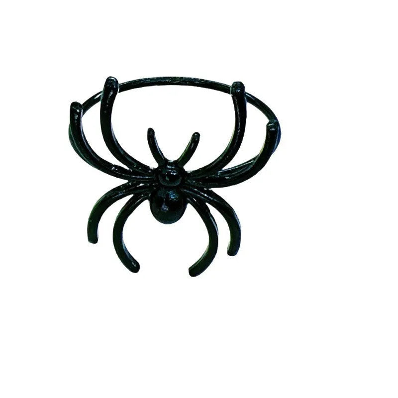 Six black spider-shaped alloy napkin rings with electrophoresis coating for Halloween table settings