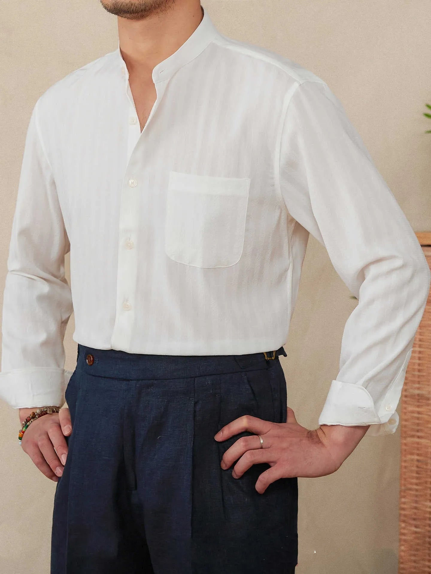 Blue and white seersucker stripe long sleeve shirt with a loose lapel baseball collar