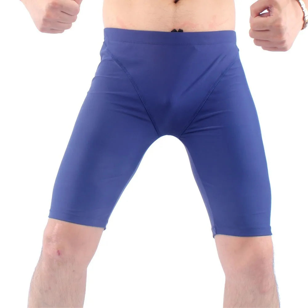 Men's green quick-drying swimming trunks with five-point fashion design and anti-embarrassment fit