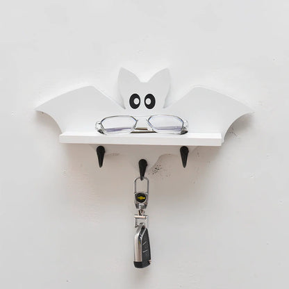 White pine animal-shaped wall shelf measuring 35cm wide by 17cm high on wall