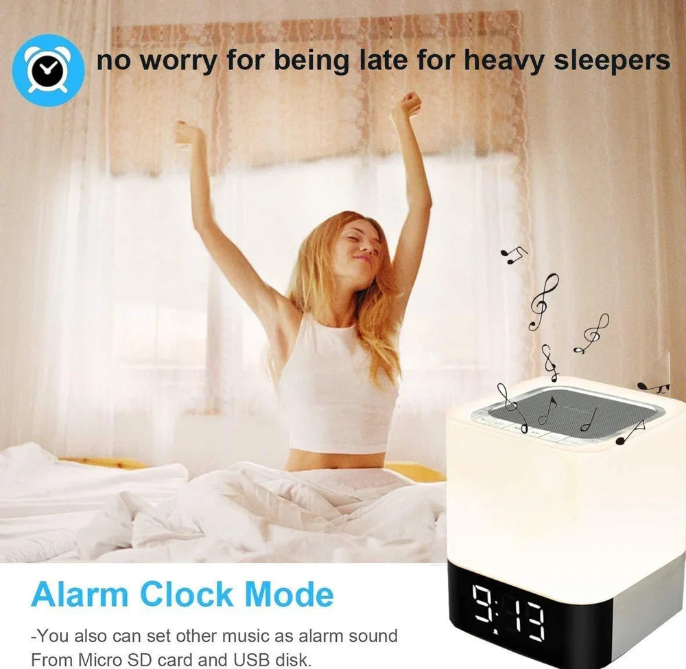 Square Bluetooth speaker alarm clock with touch screen and multi-colour LED lighting, measuring 100x100x112mm