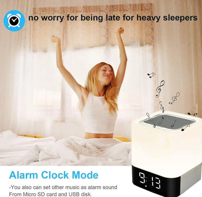 Square Bluetooth speaker alarm clock with touch screen and multi-colour LED lighting, measuring 100x100x112mm