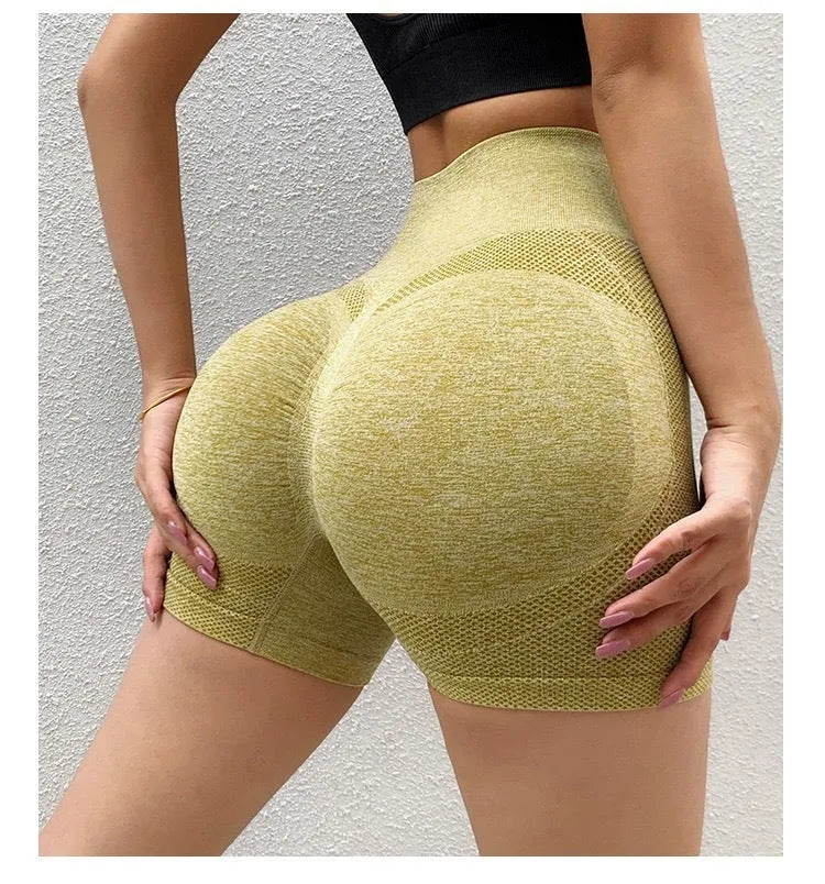 Women's high-waisted black seamless yoga shorts for fitness and running.