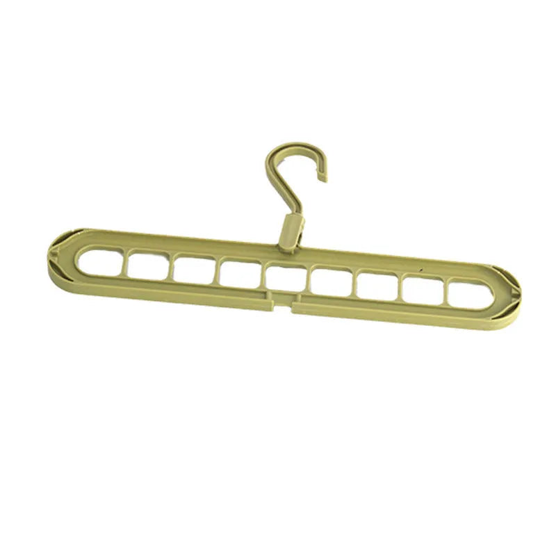 Green nine-hole folding hanger with trousers organised across nine hanging points, showing 45cm width
