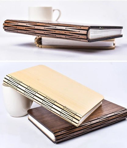 LED book lamp with wooden cover open at angle showing illuminated pages and USB cable