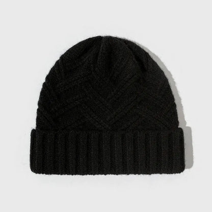 Wool knitted women's hat with dome crown in ankela red colour showing totem pattern details