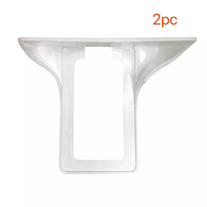 White wall outlet organizer with rubber pad for easy cable management