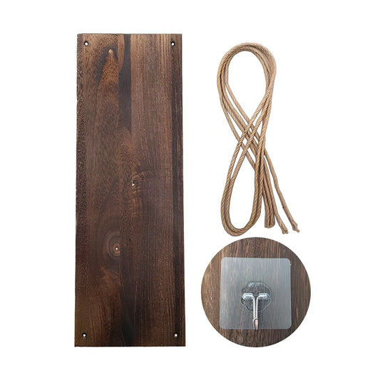 Natural wood wall-mounted shelf displaying small plants and framed photos with 1.3m hanging cord