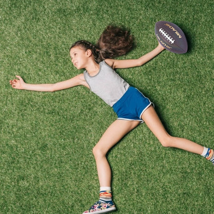 Luminous Rugby Reflective Soccer Ball glowing under light