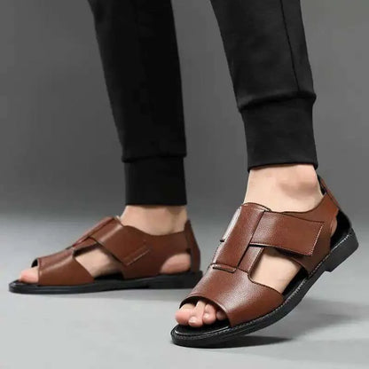 Men's black and brown leather casual open-toe sandals with a strapped design and textured rubber sole.