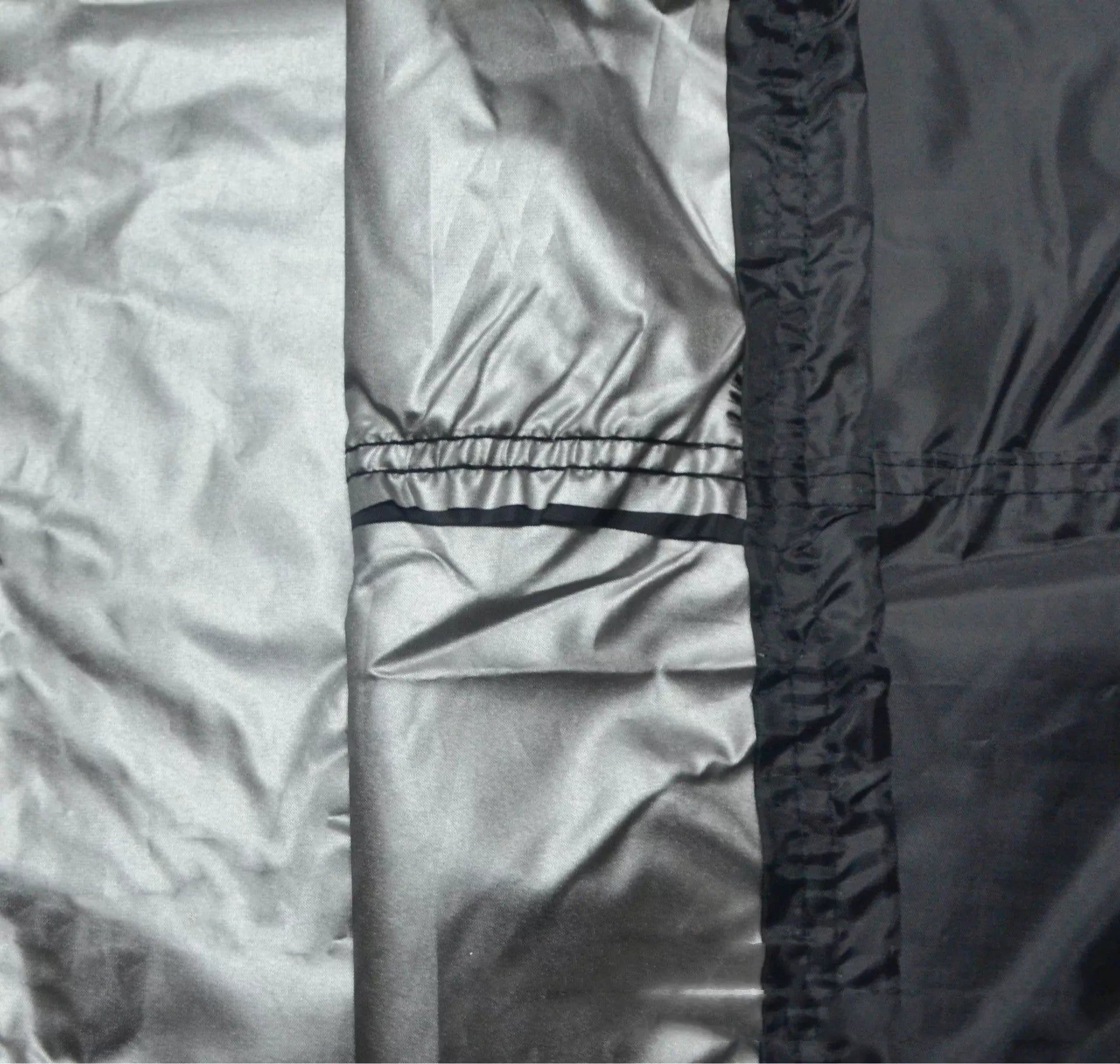 Outdoor grill cover with black exterior and silver interior, 58*77CM