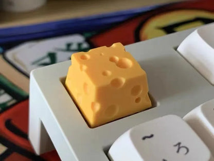 Yellow resin cheese key cap with 3D sculpted design for mechanical keyboards