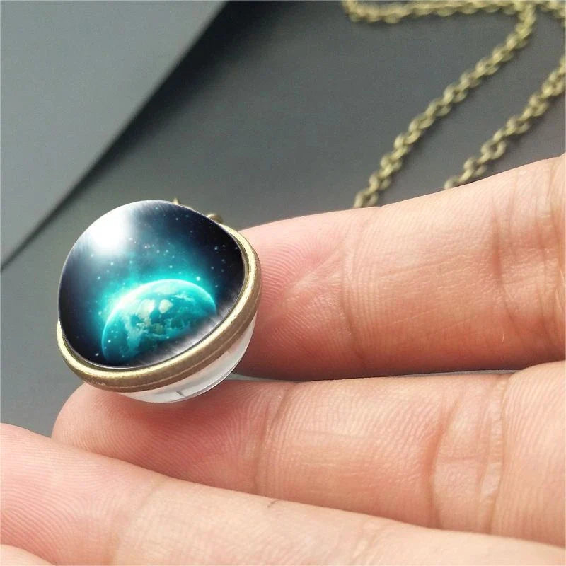 Mesmerizing double-sided galaxy pendant necklace in various celestial patterns and colors