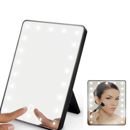 Black LED makeup mirror with 16 lights around 225mm × 165mm frame on dressing table
