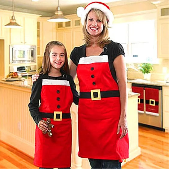 Red Christmas apron with Merry Christmas text available in adult and children's sizes