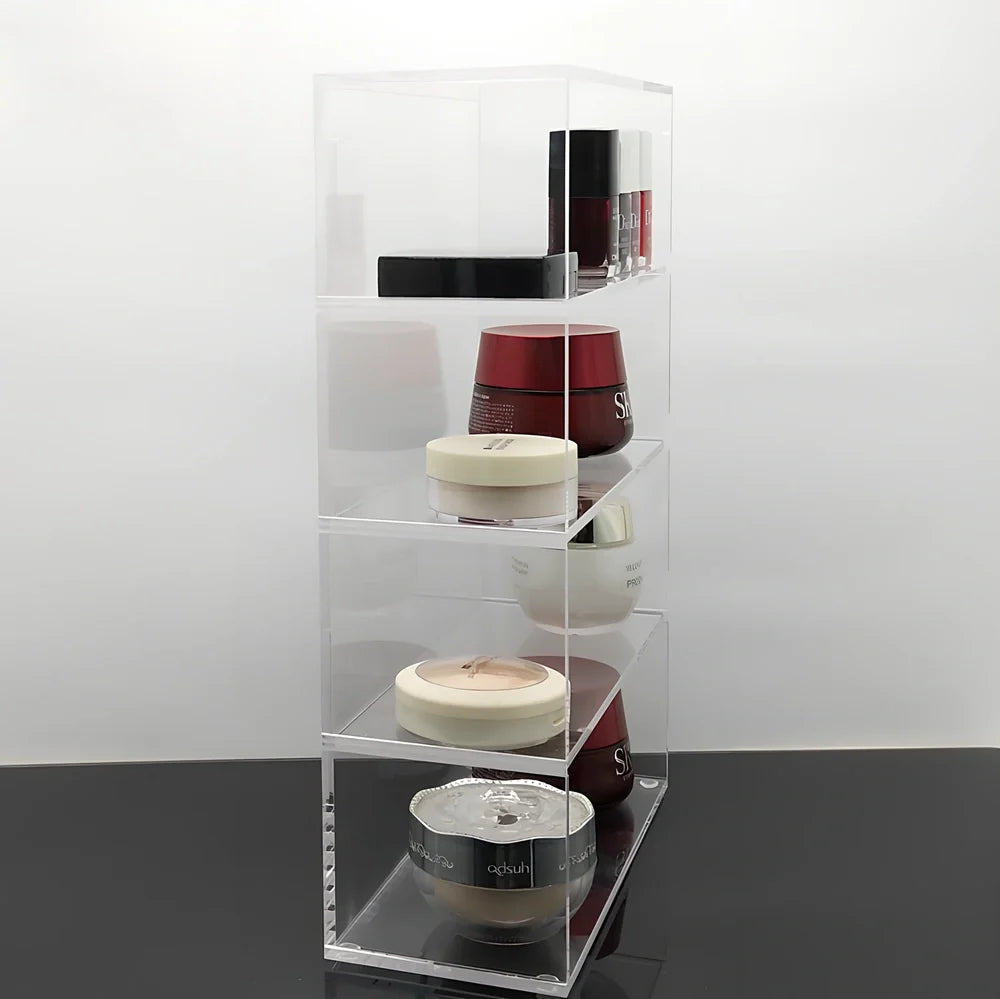 Clear acrylic cosmetic storage box measuring 24x10x34cm with transparent sides showing makeup organisation