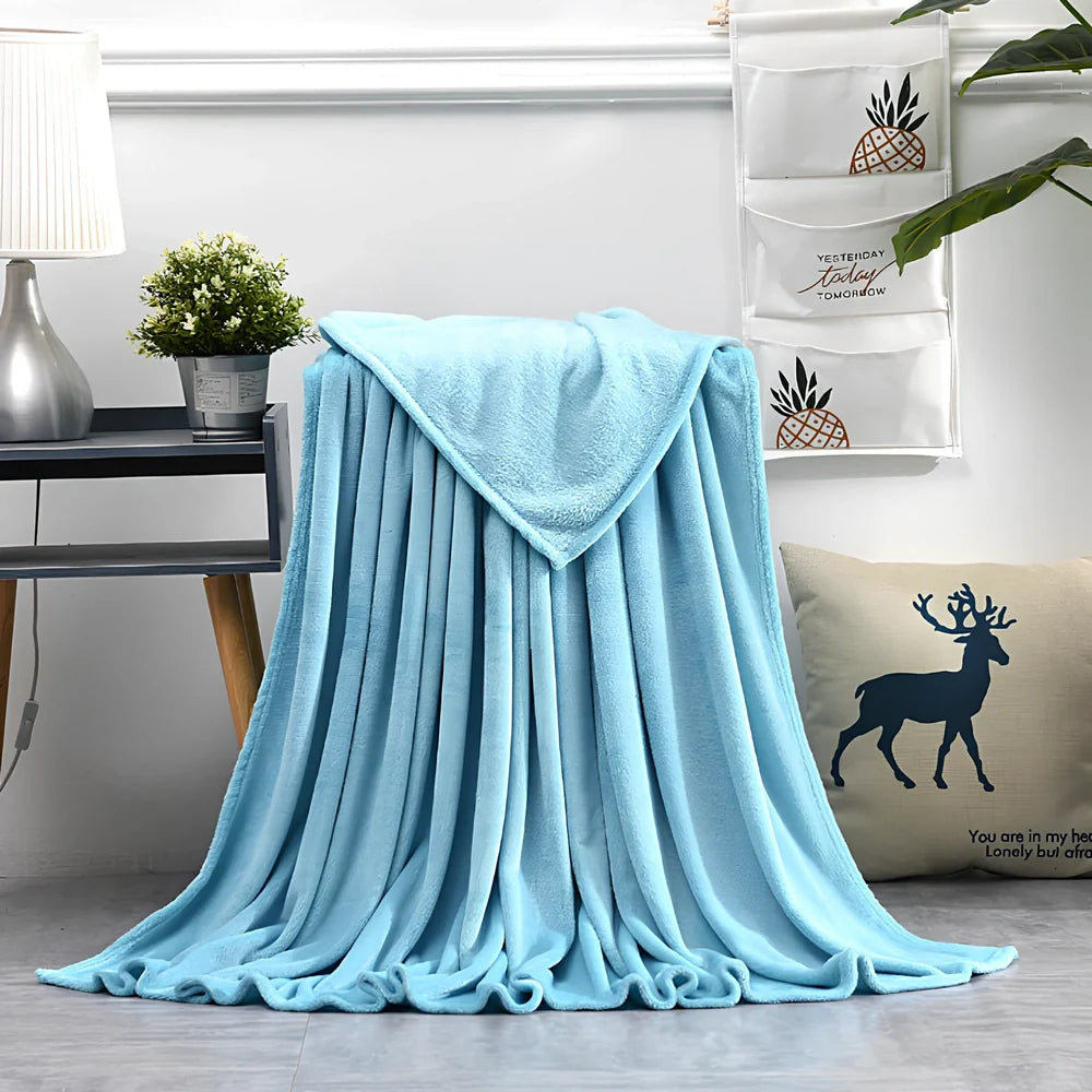 Coral fleece flannel blanket in beige showing textured surface and consistent edges