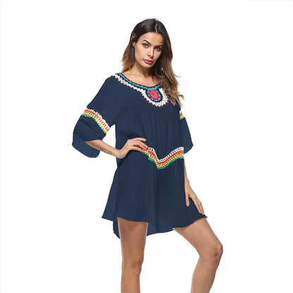 Women's crocheted ethnic style beach cover-up top in apricot colour, for sun protection.
