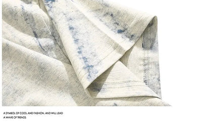 Grey tie dye pattern cotton t-shirt with loose fit and round neck collar