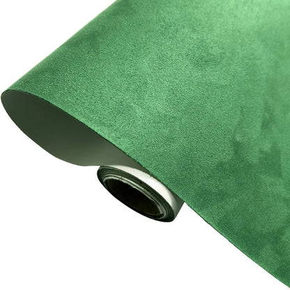 Rolls of self-adhesive leather suede in multiple colours showing texture and adhesive backing.