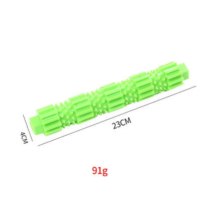Green and orange rubber dog chew toy for aggressive chewers with treat dispensing feature