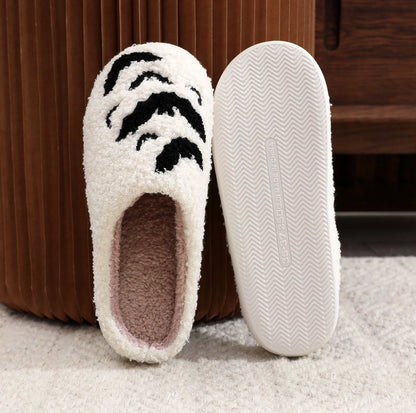 Halloween bat design plush slippers for indoor wear, available in white and black