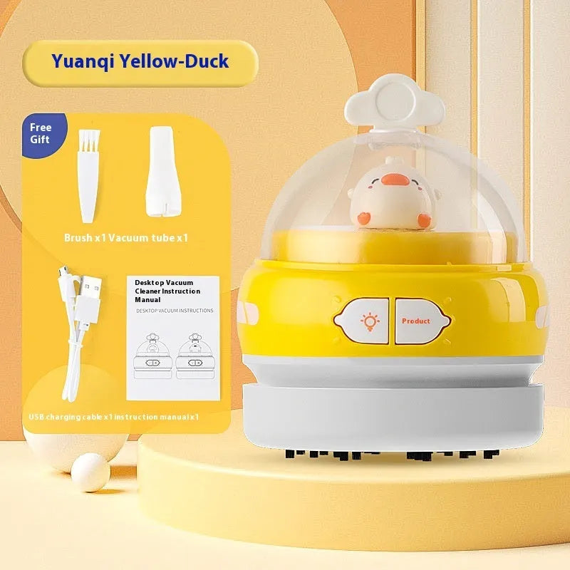 USB-powered handheld desktop vacuum cleaner in blue colour cleaning computer keyboard
