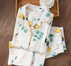 Traditional maternity pajama set with 100% cotton batik fabric, ankle-length trousers, and full-length bell sleeves