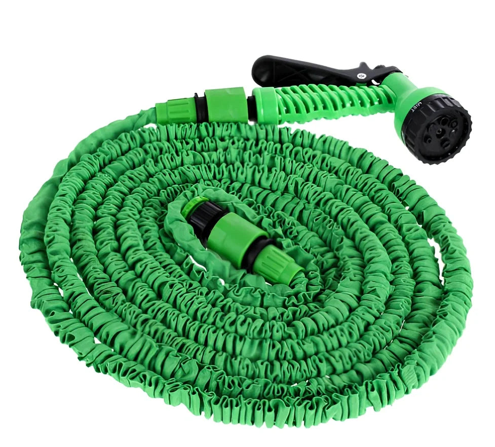 Blue telescopic water hose with high-pressure gun, expanded for use in garden watering