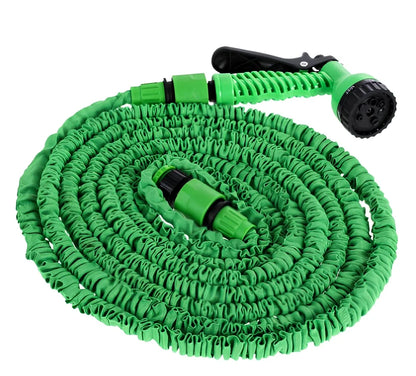 Blue telescopic water hose with high-pressure gun, expanded for use in garden watering