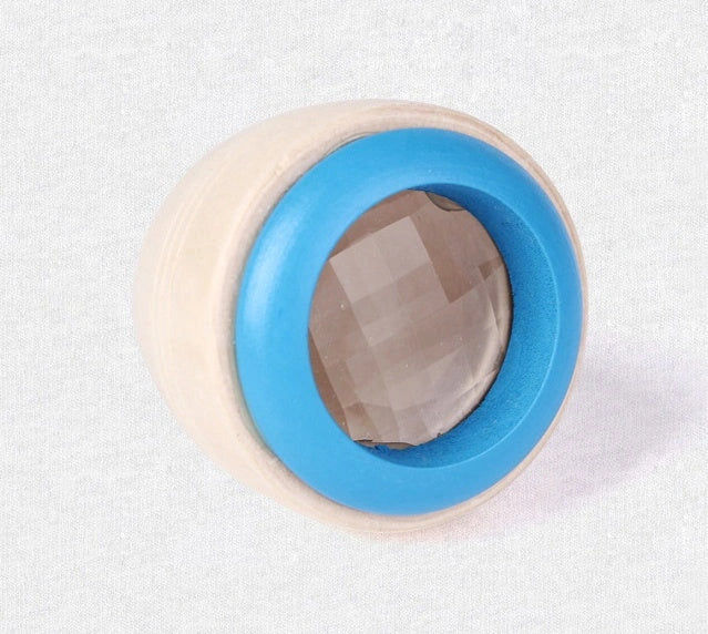 Wooden Magic Kaleidoscope toy for children with colorful patterns
