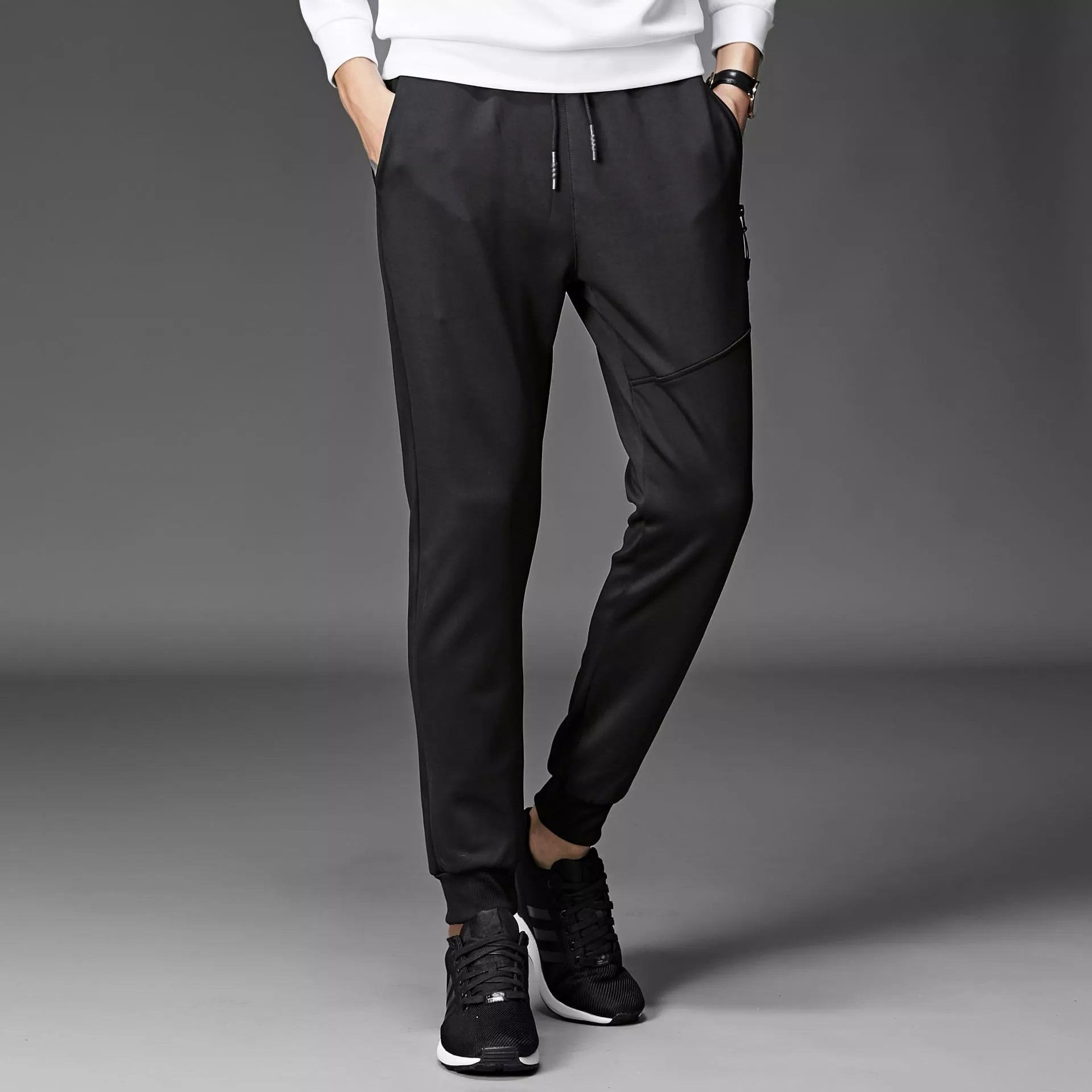 Men's winter sports pants in black and grey, made with South Korean silk fabric for warmth and flexibility