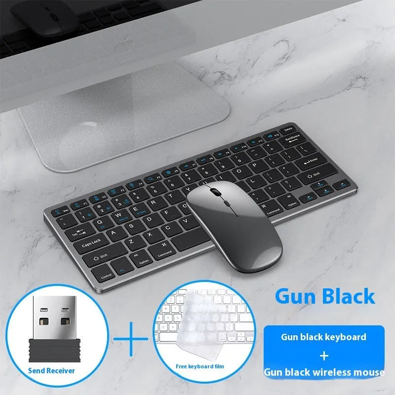 Black ultra-thin wireless keyboard and mouse combo with USB receiver and keyboard cover on a desk.