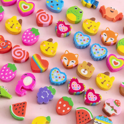 Assortment of 50 small cartoon erasers in pearlescent bags, showing fruit, animal, and holiday designs.