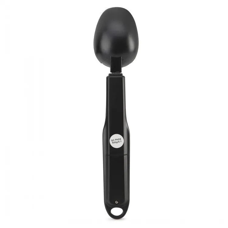 Smart digital measuring spoon with electronic display showing weight, alongside two AAA batteries.