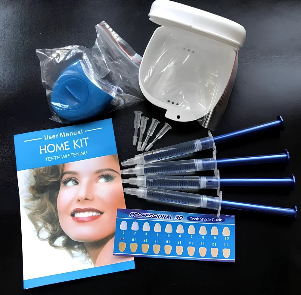 Teeth whitening gel kit with thermoform trays, cold light lamp, 10 gel syringes, and 3D shade guide showing 7-10 improvement