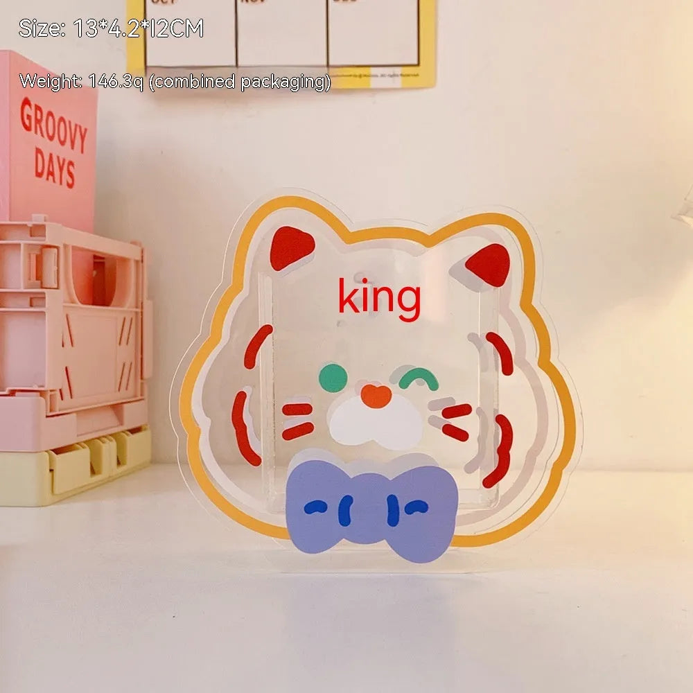 Square transparent acrylic storage box with printed character theme containing coloured pens