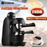 Black home mini espresso machine with Italian-style design and steam-powered brewing system